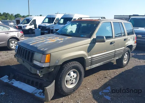 1997 Jeep Grand Cherokee Limited z USA, uszkodzony, nr VIN 1J4GZ78Y5VC613495